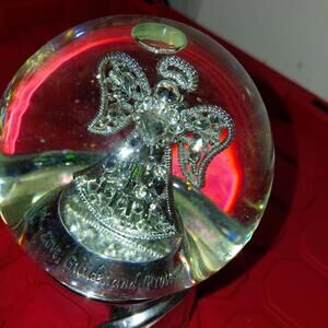 My guardian angel musical snow globe plays pachebles Canon